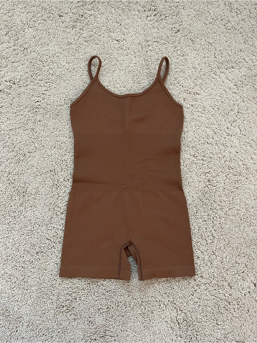 brown body suit